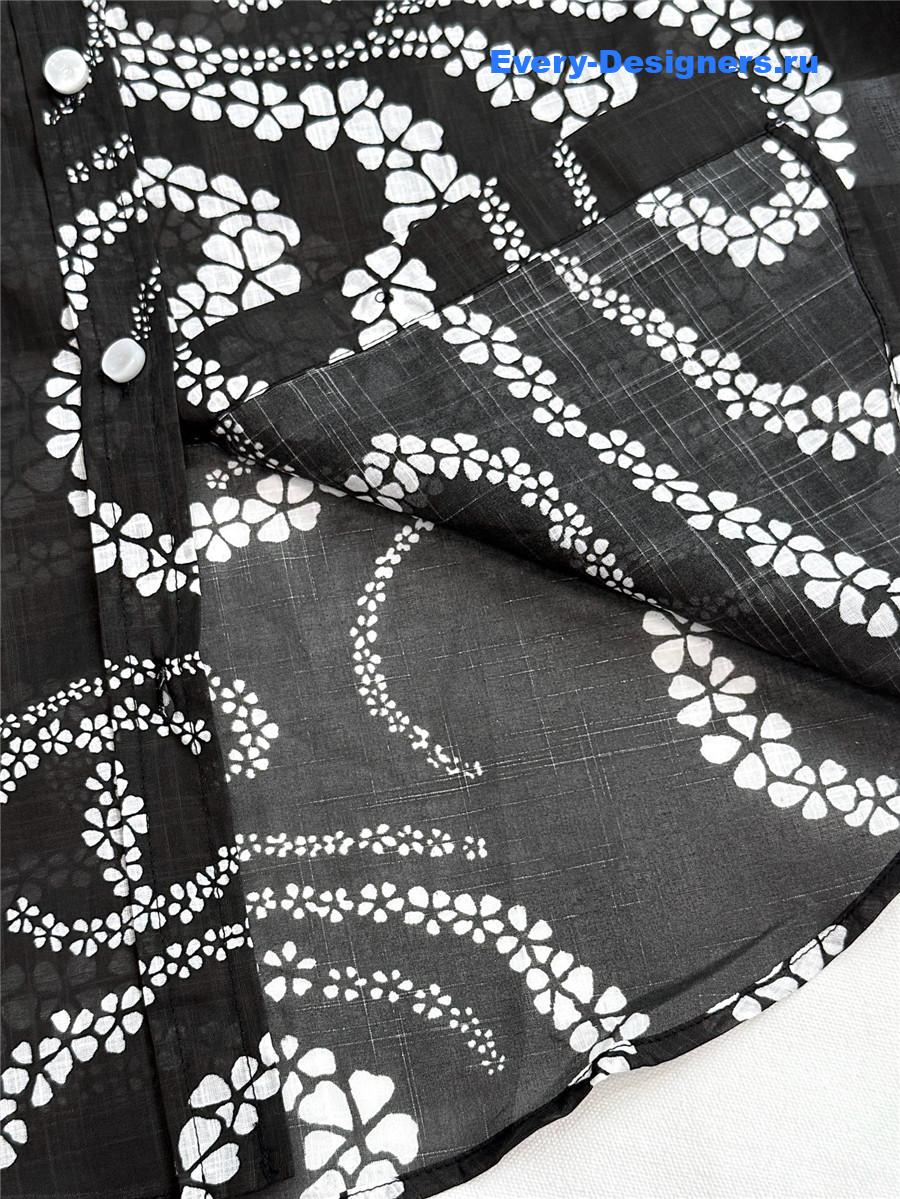 Ch**el coco beach black shirt