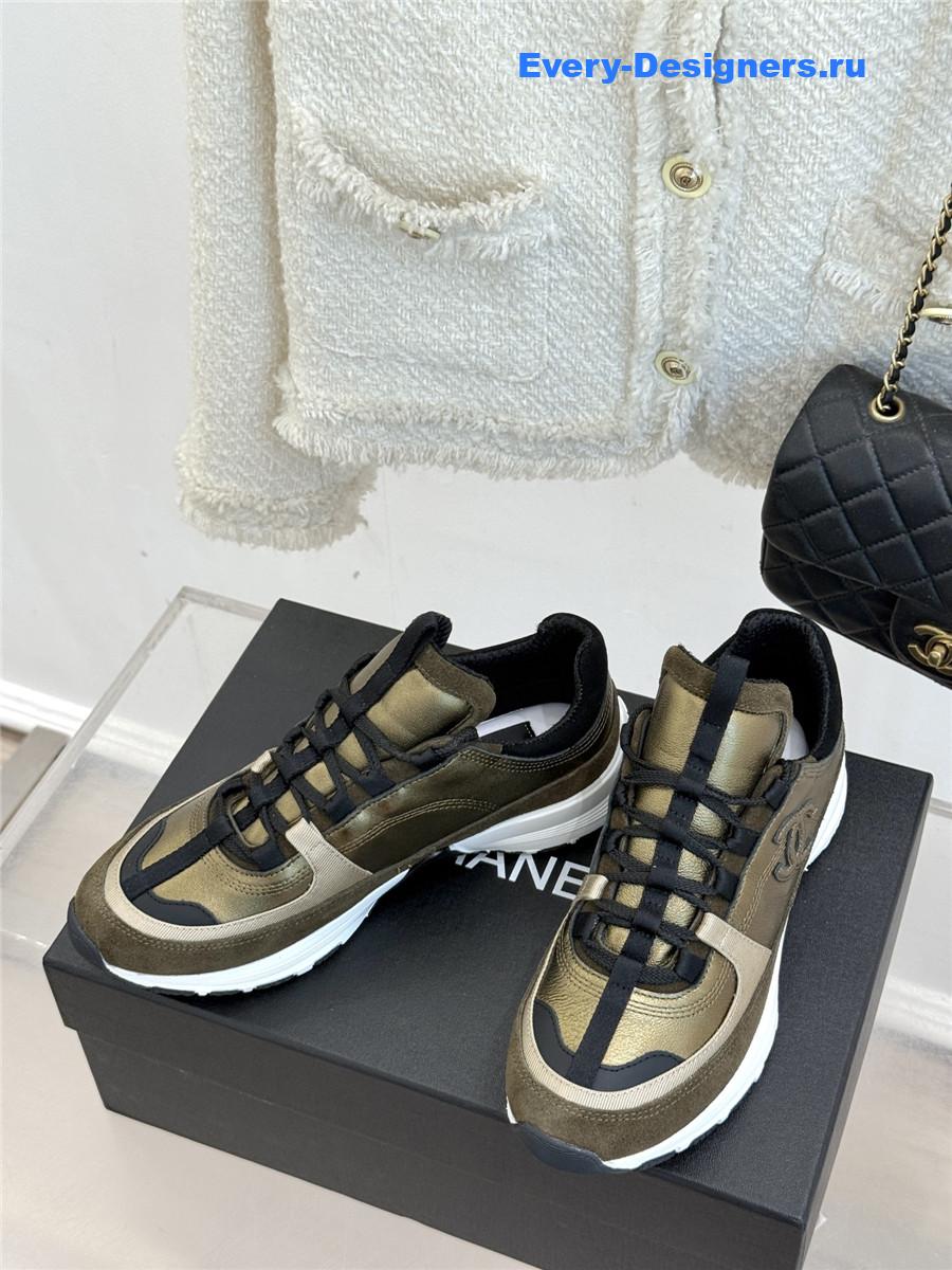 Ch**el laminated calfskin suede gold trainers