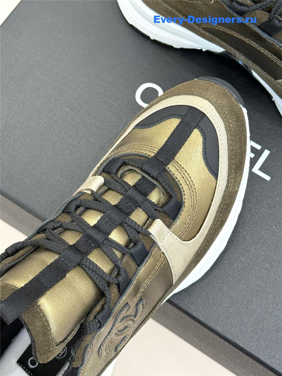 Ch**el laminated calfskin suede gold trainers