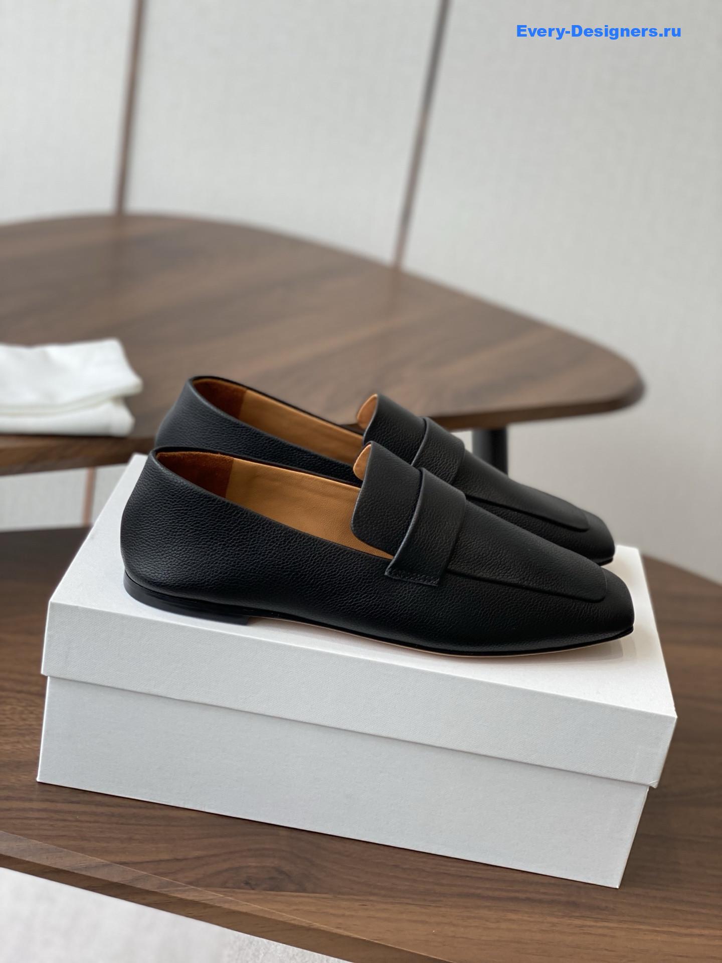 The R0w black square leather loafers