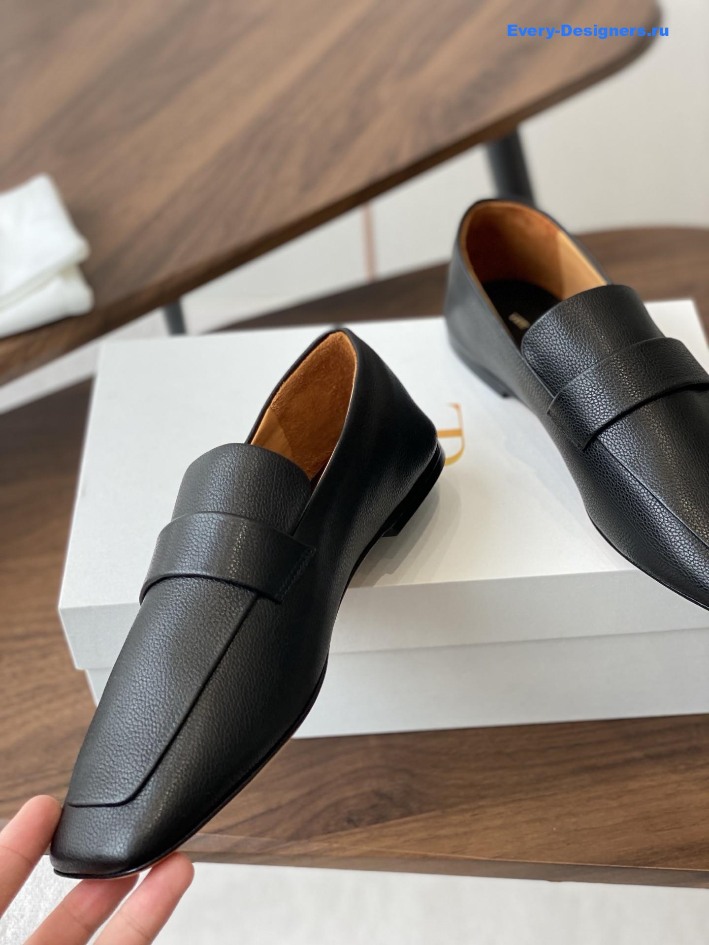 The R0w black square leather loafers