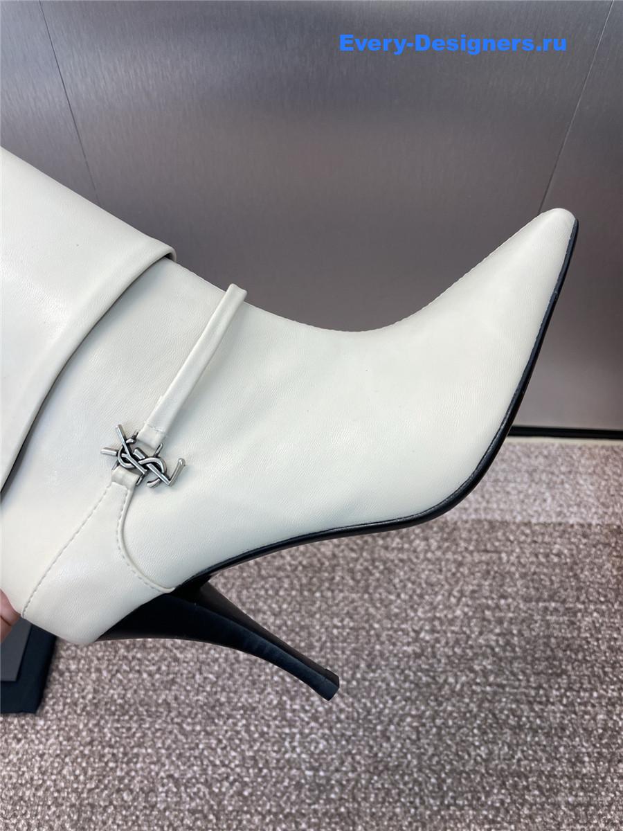 Sa1nt Lau*nt white buckle ankle boots