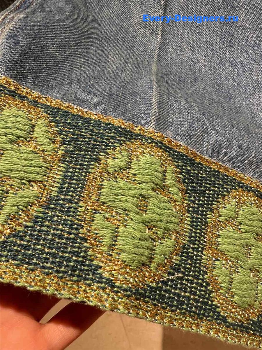 Va1e*ntin0 jacquard-trimmed wide-leg jeans