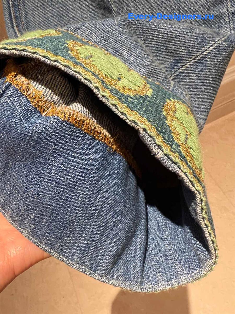 Va1e*ntin0 jacquard-trimmed wide-leg jeans