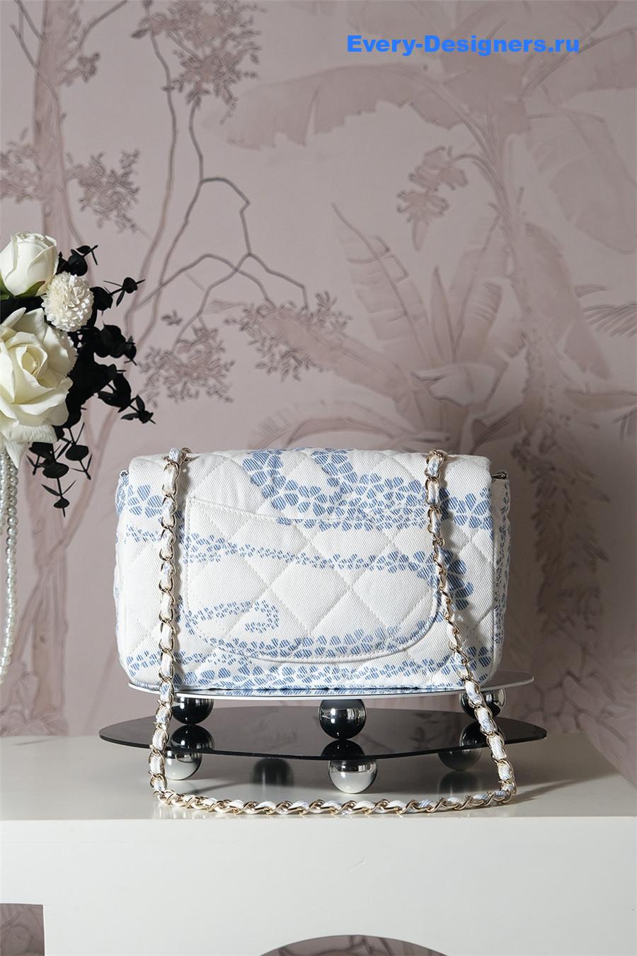 Ch**el white & blue denim hobo bag