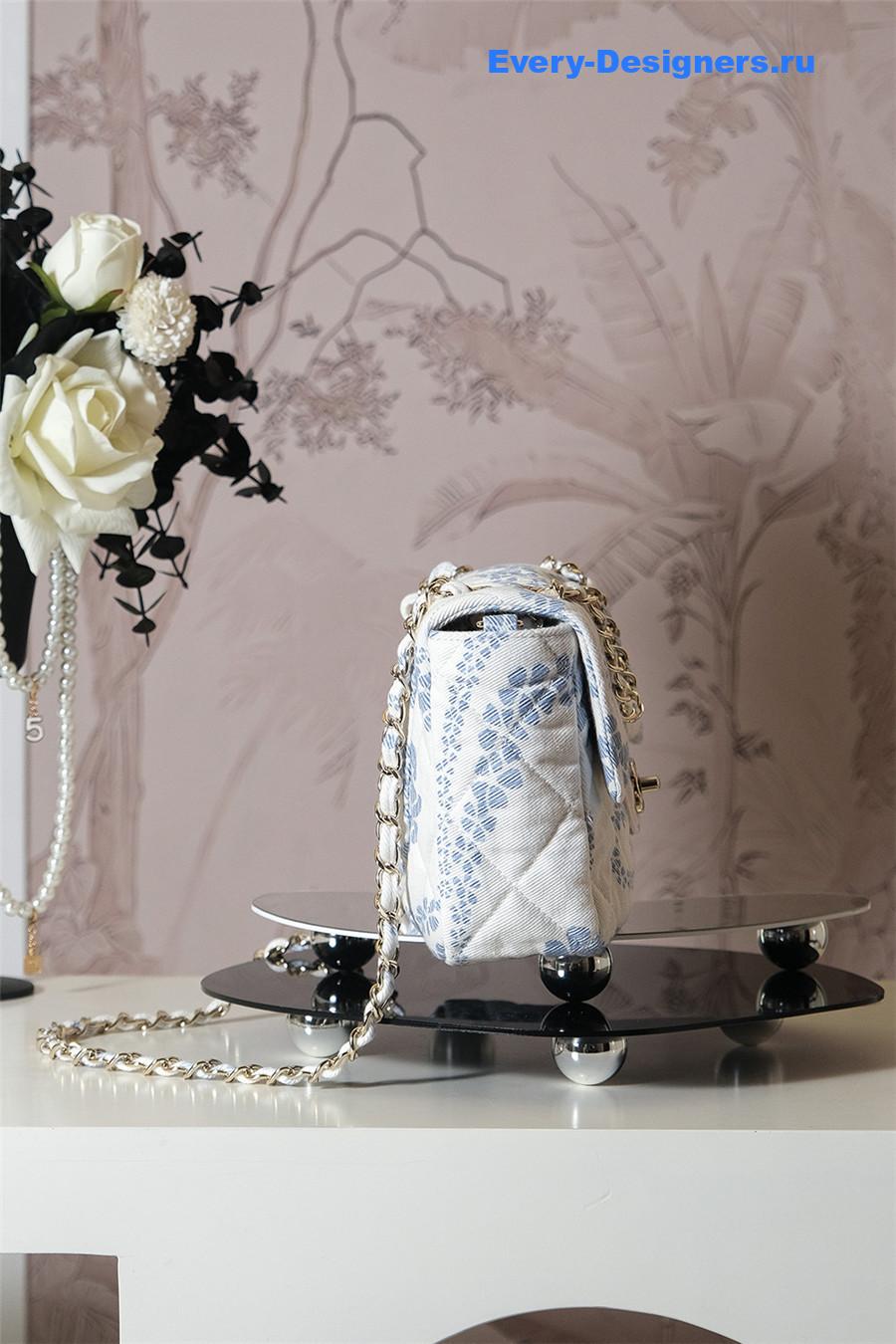 Ch**el white & blue denim hobo bag