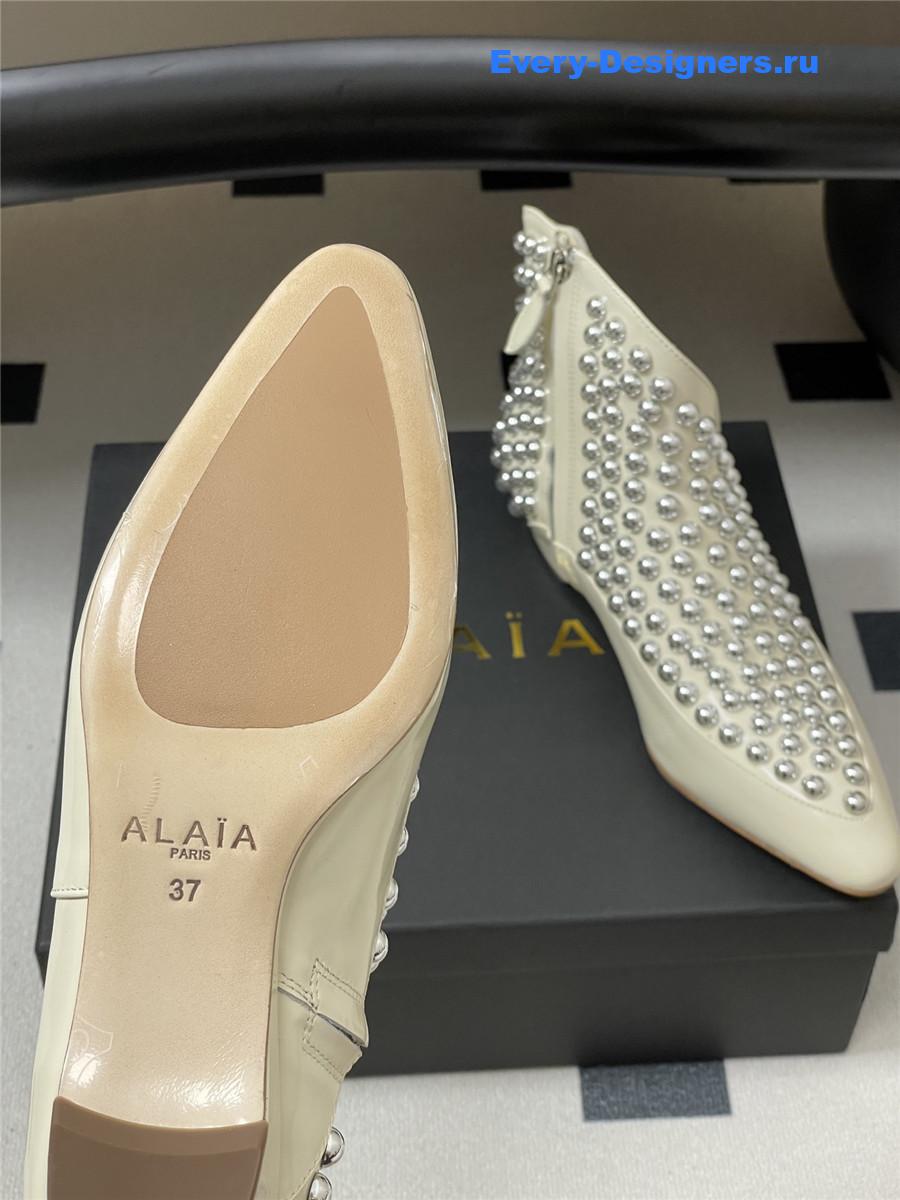 ALAIA Studded White Leather Ankle Boot