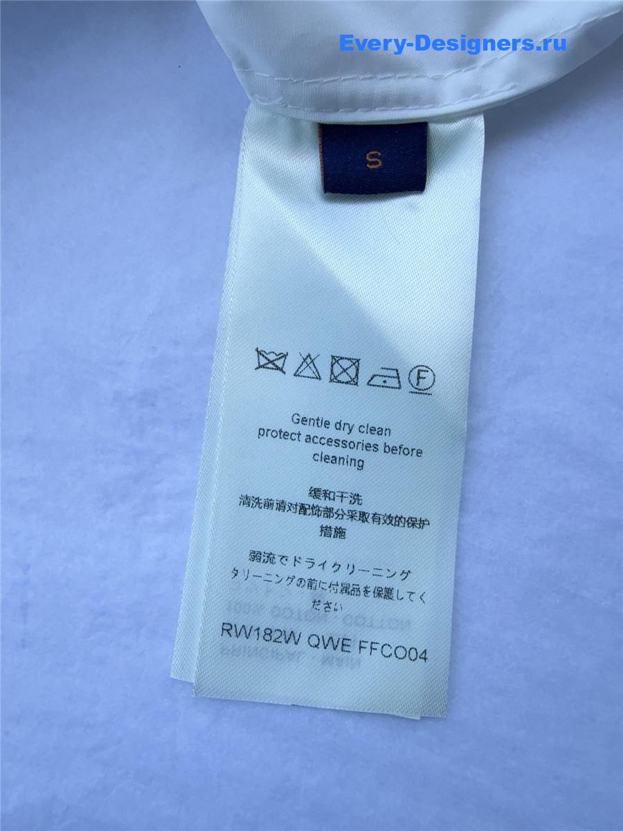 l0vis Vvtt0n white ruffle neck shirt