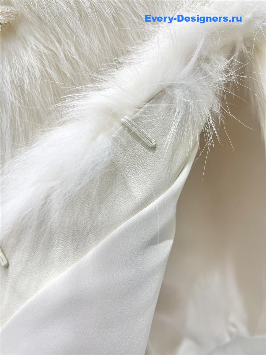 Sa1nt Lau*nt white faux fur coats