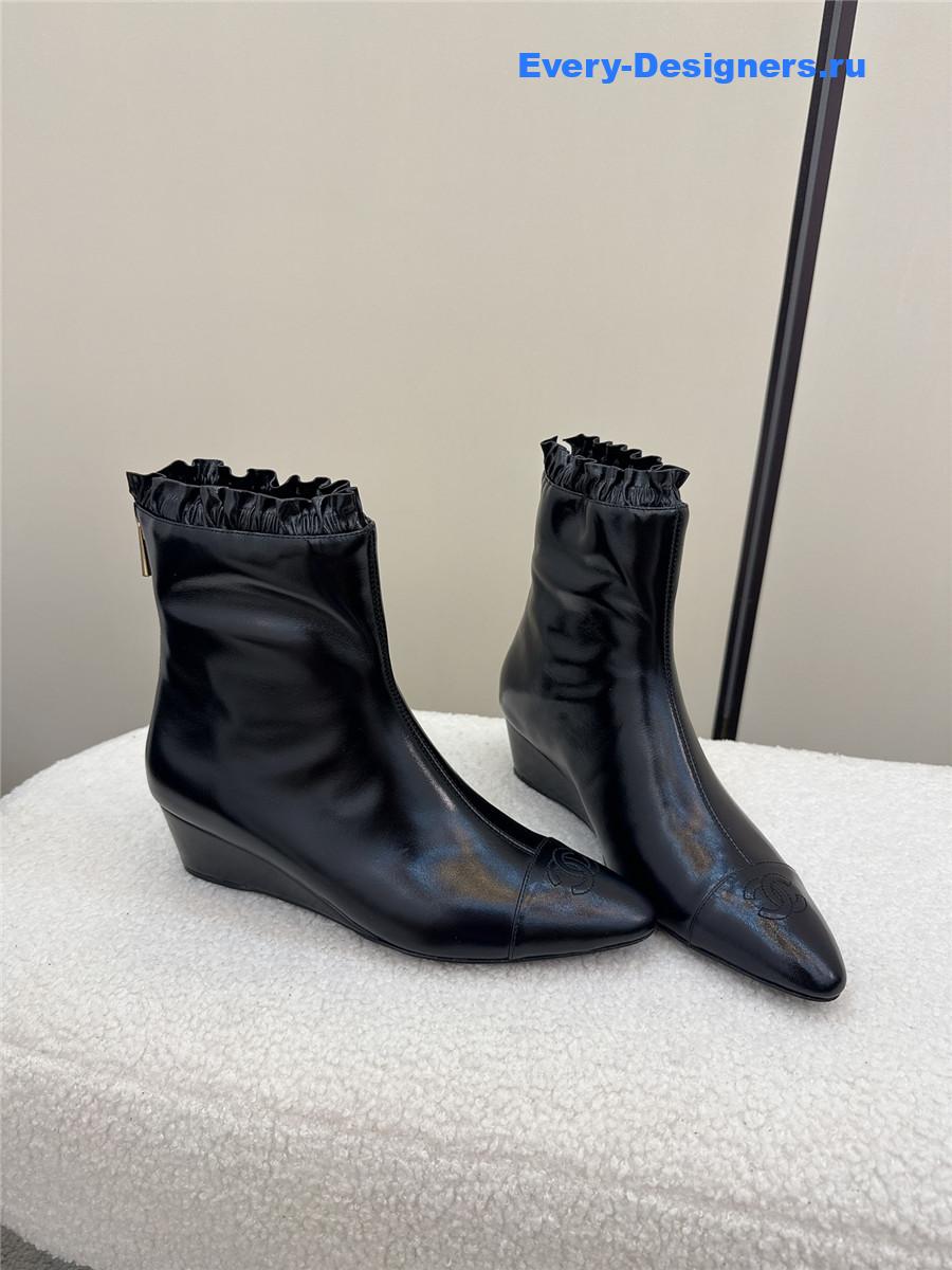 Ch**el black pointed wedge ankle boots