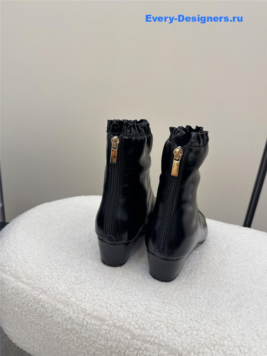 Ch**el black pointed wedge ankle boots