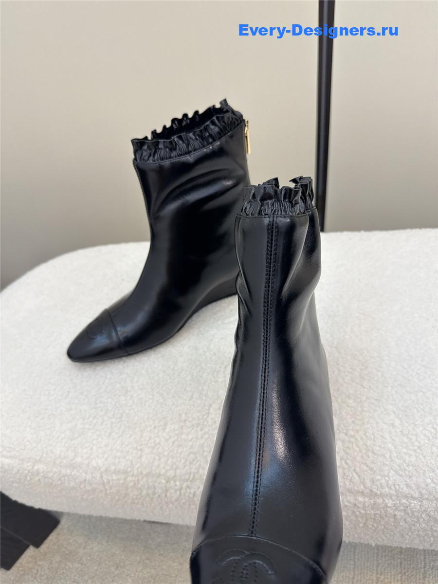 Ch**el black pointed wedge ankle boots