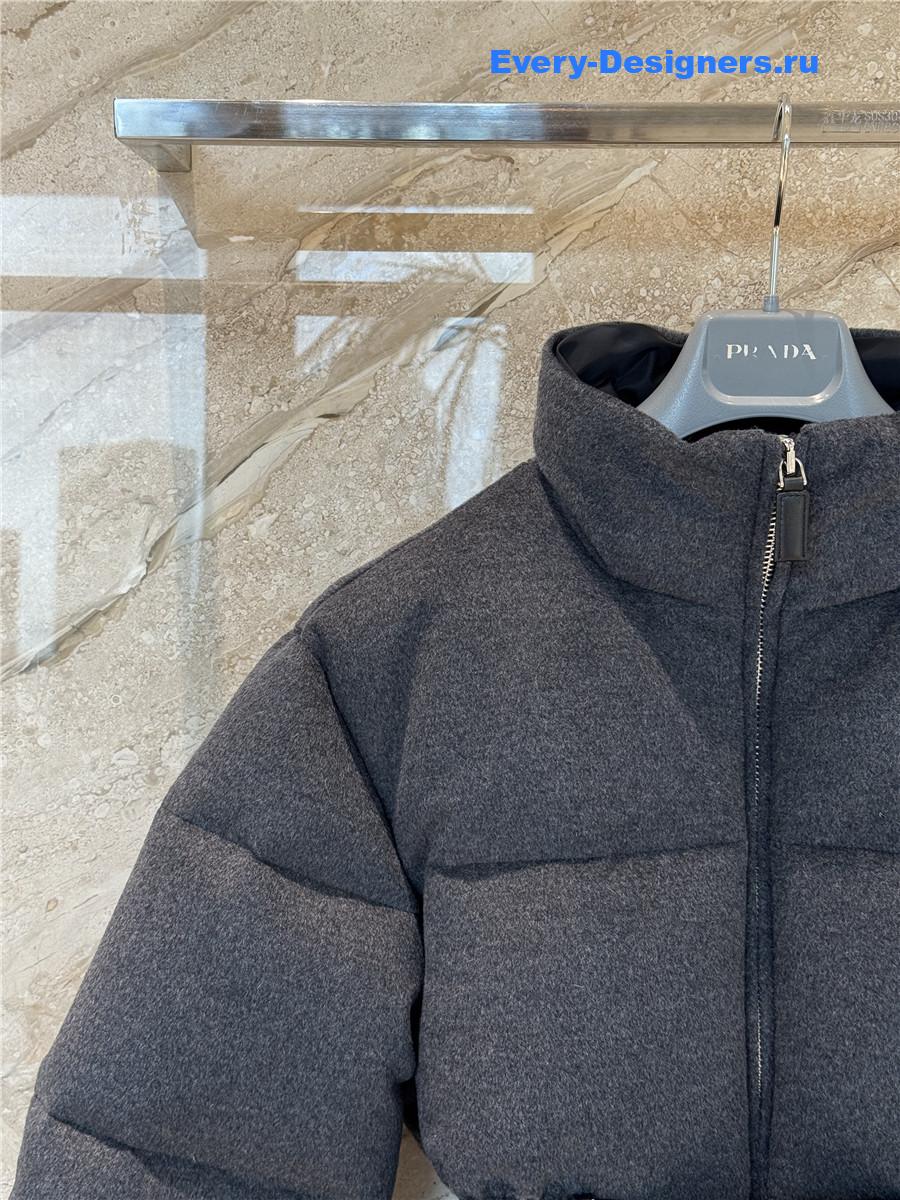 Pra*a belted logo-plaque down jacket