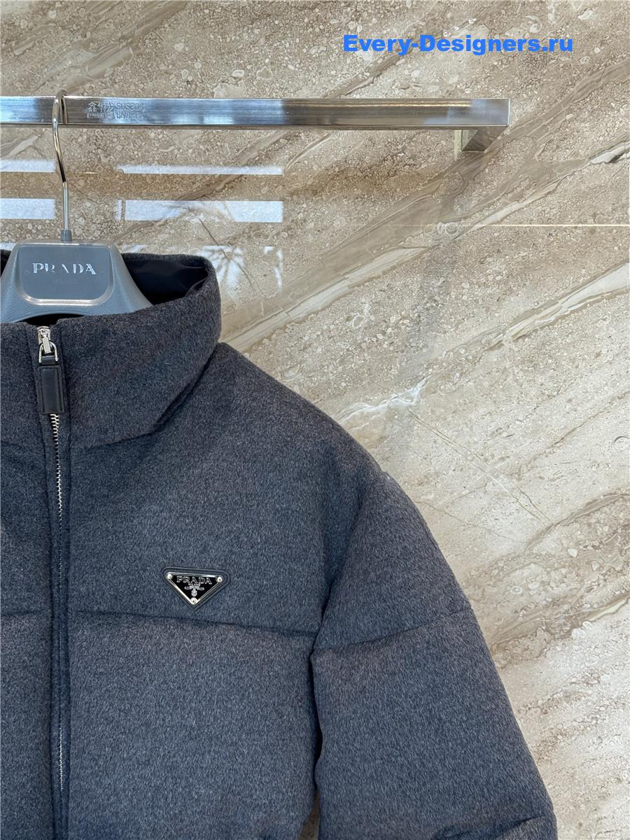 Pra*a belted logo-plaque down jacket