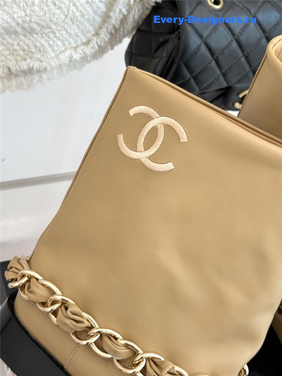 Ch**el beige leather black cap toe chain boots