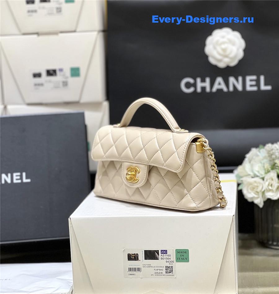 Ch**el beige lambskin top handle flap bag