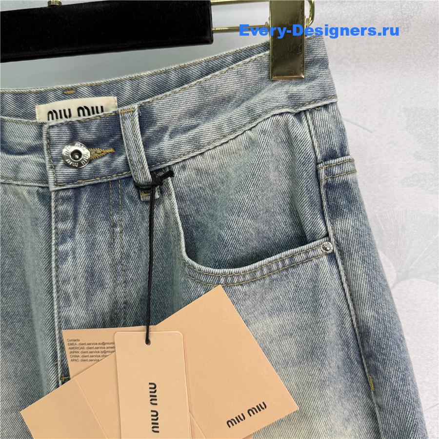 Miu Miu Badge Scimitar Wide-leg Jeans