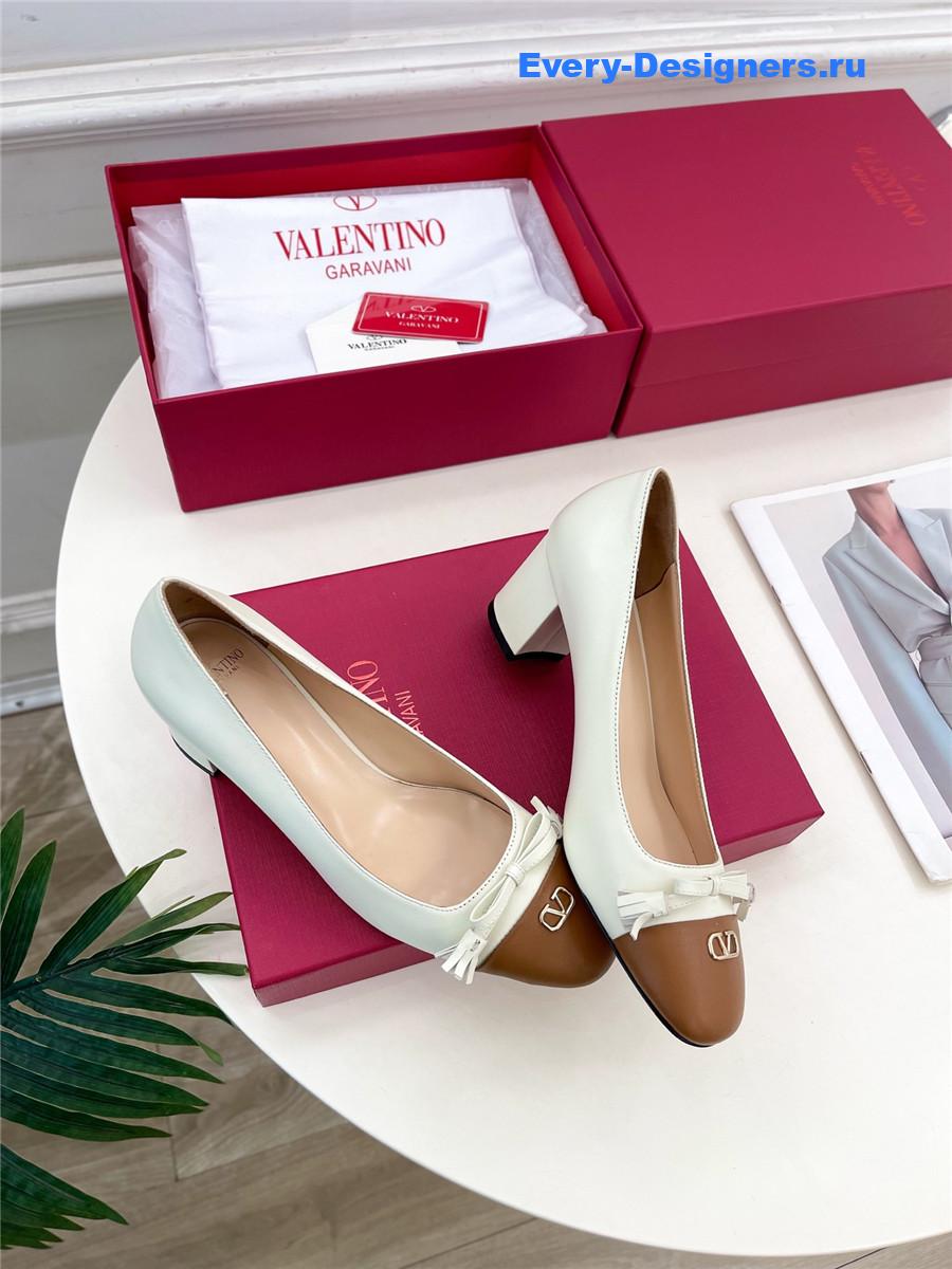 Va1e*ntin0 garavani white mid-heel pumps