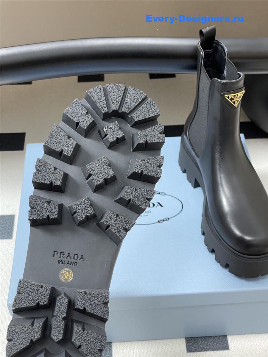 Pra*a black monolith brushed leather booties