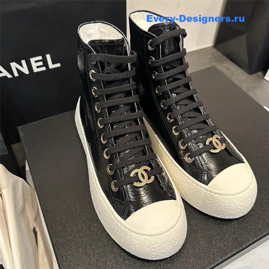 Ch**el high-top waxed leather lace-up sneakers