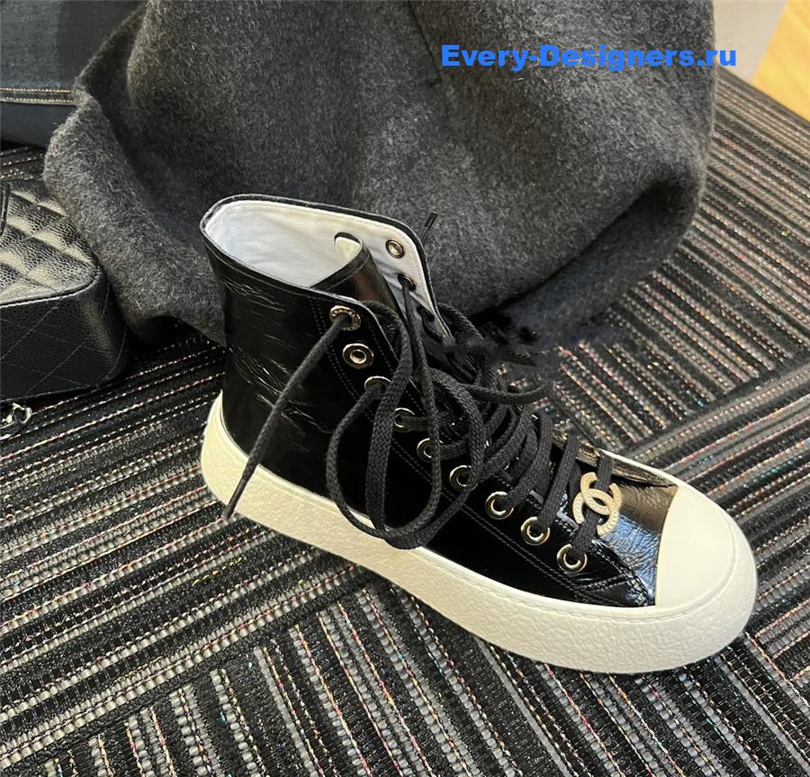 Ch**el high-top waxed leather lace-up sneakers