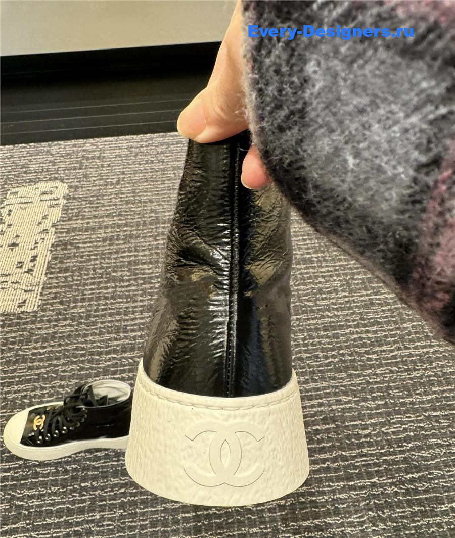 Ch**el high-top waxed leather lace-up sneakers