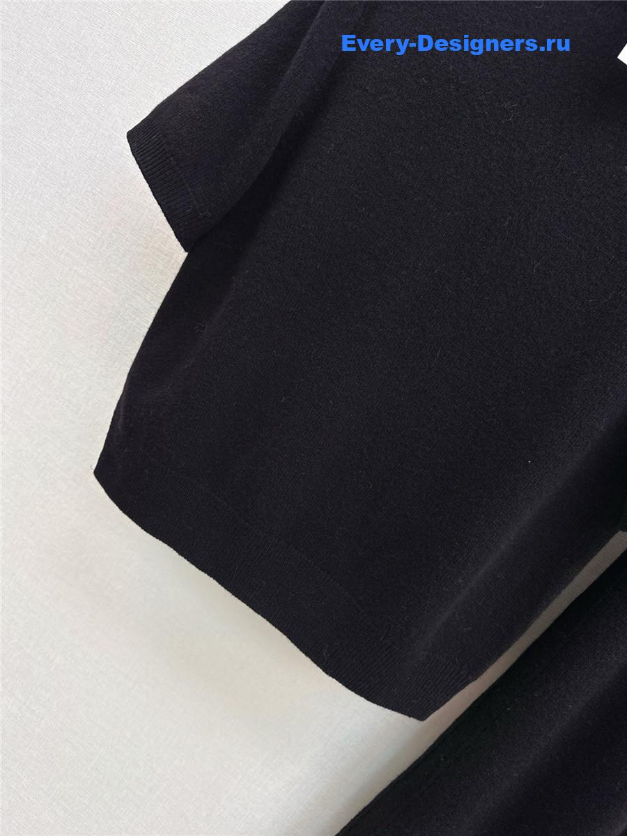 The R0w black turtleneck short-sleeved suit