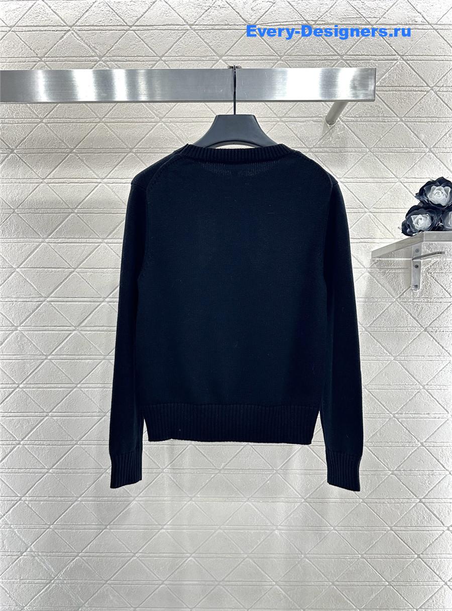 Ch**el black embroidered-bow sweater
