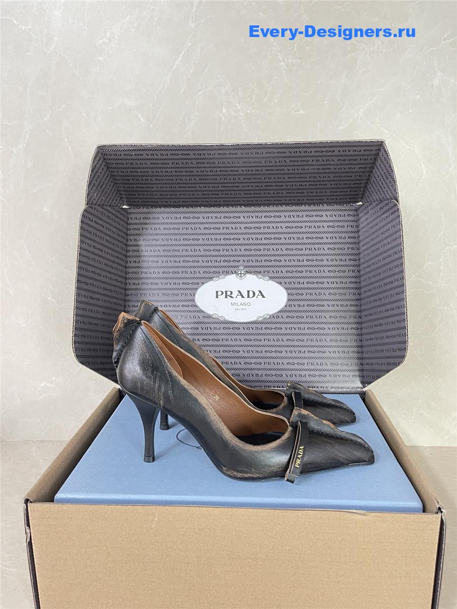 Pra*a black leather bow pumps