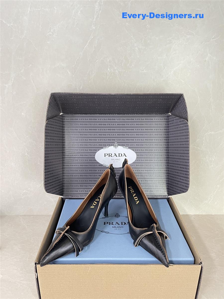 Pra*a black leather bow pumps