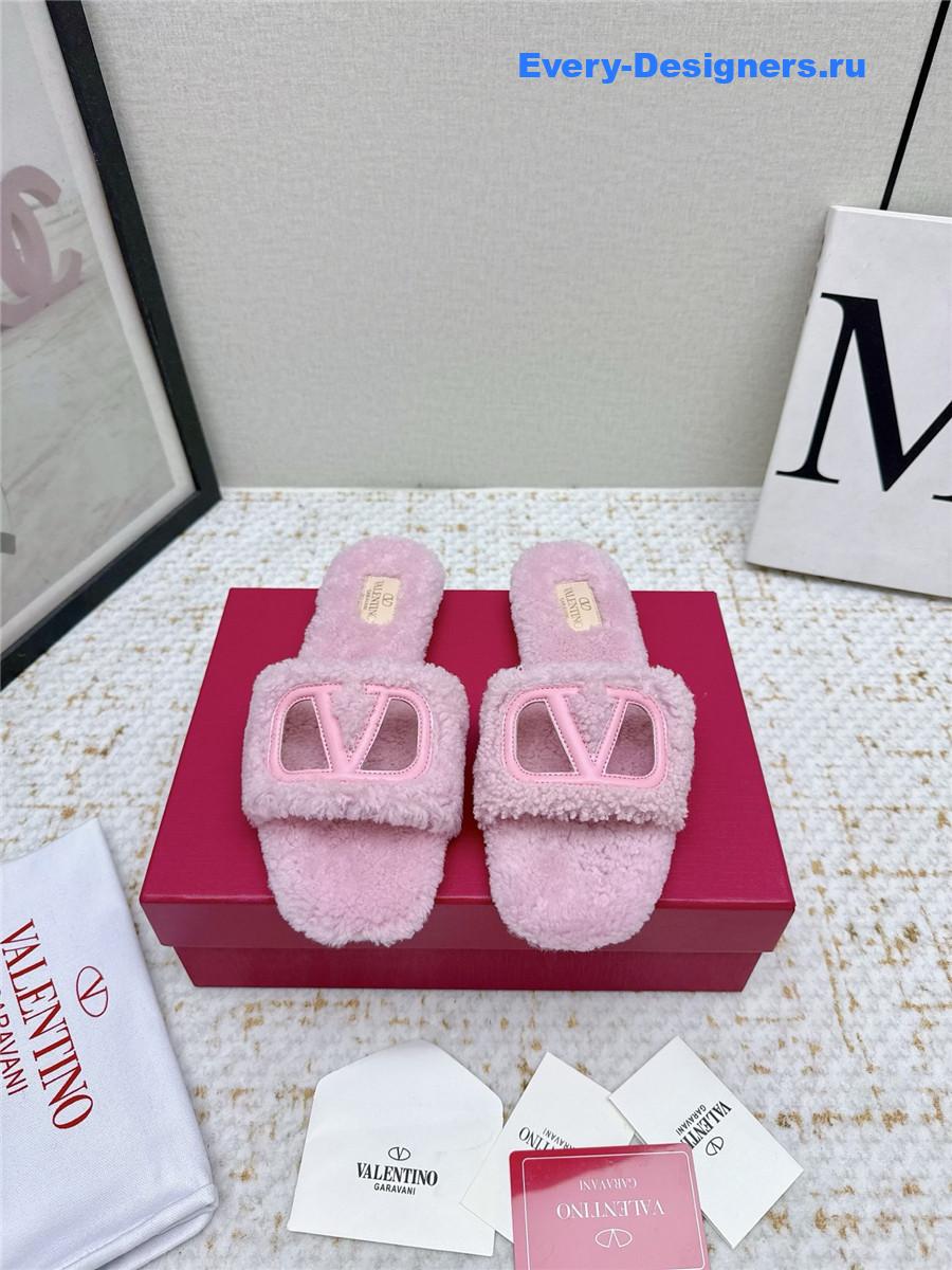 Va1e*ntin0 pink vlogo cutout faux shearling slides