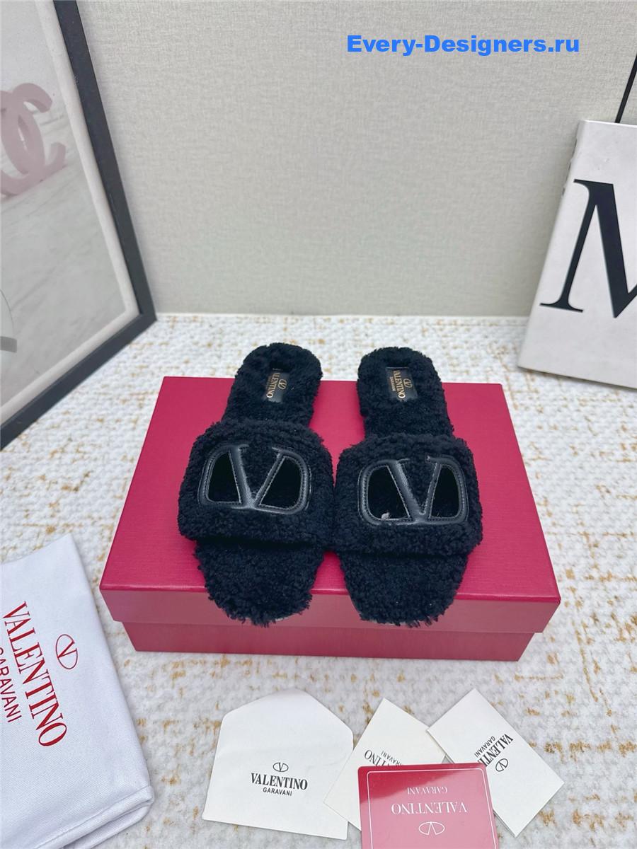 Va1e*ntin0 black vlogo cutout faux shearling slides