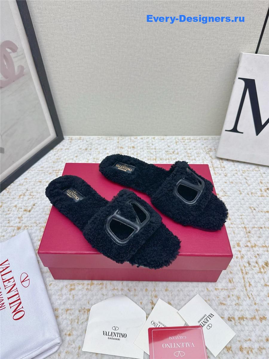 Va1e*ntin0 black vlogo cutout faux shearling slides