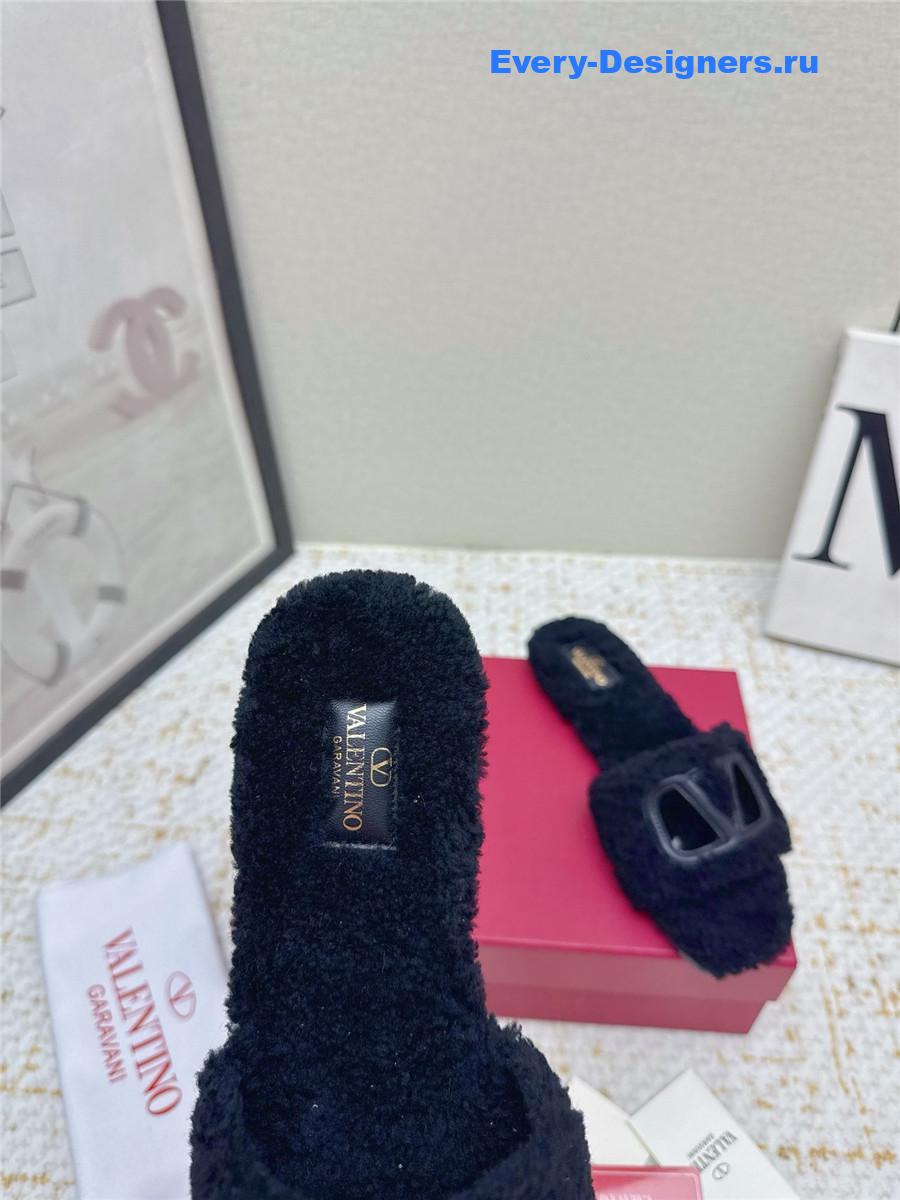 Va1e*ntin0 black vlogo cutout faux shearling slides