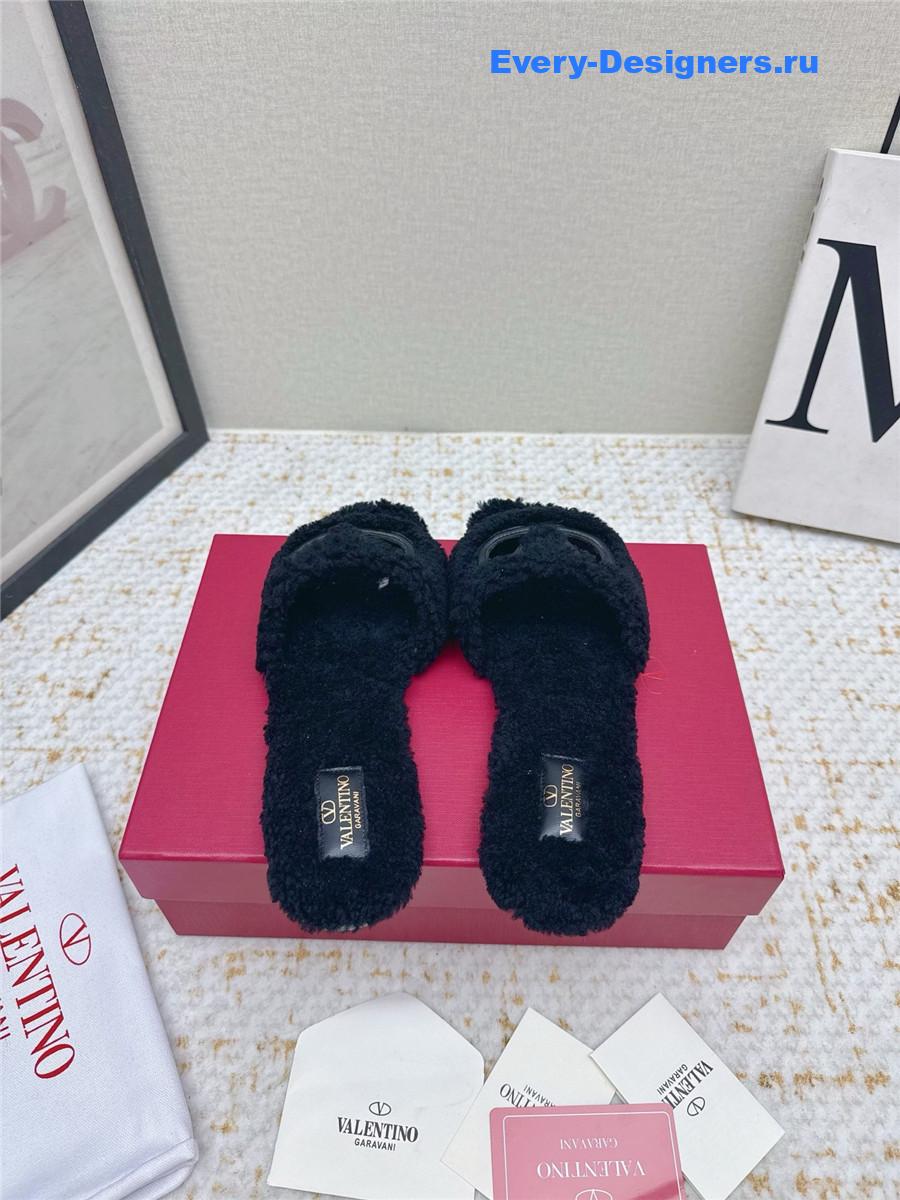 Va1e*ntin0 black vlogo cutout faux shearling slides